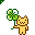 A Cat holding a clover leaf