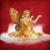 Gold fairy on red.