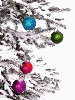 snowy christmas tree and ornaments