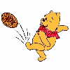 Pooh bear kicking a football